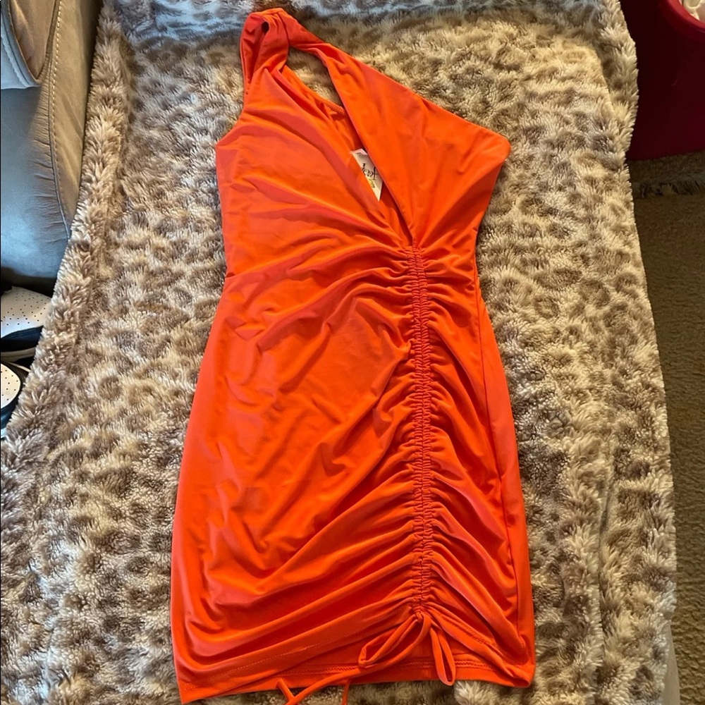 One shoulder orange mini dress